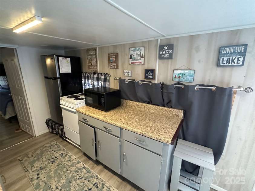 105 Marina Lane, New London, NC 28127.  MLS# CAR4276987, YatesRealty ID 30102. 