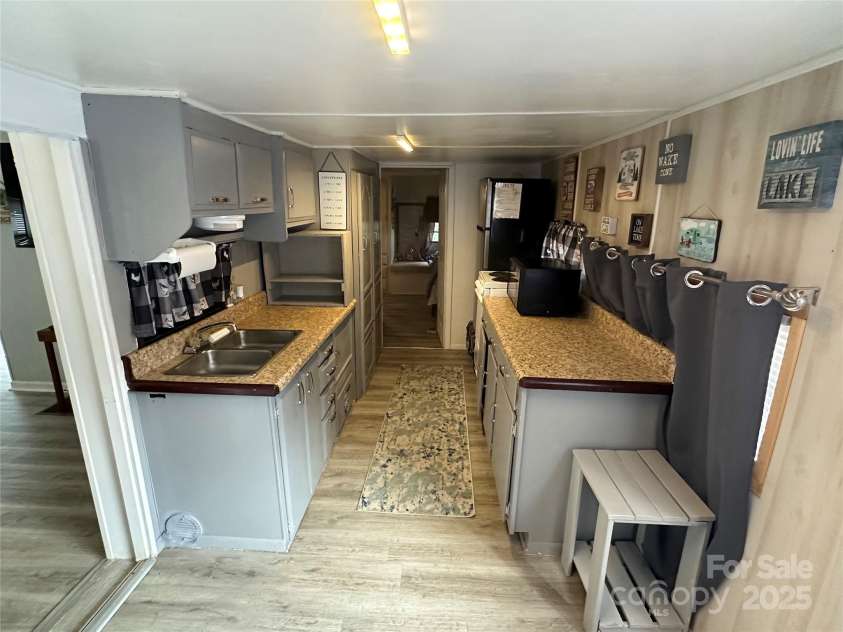 105 Marina Lane, New London, NC 28127.  MLS# CAR4276987, YatesRealty ID 30102. 