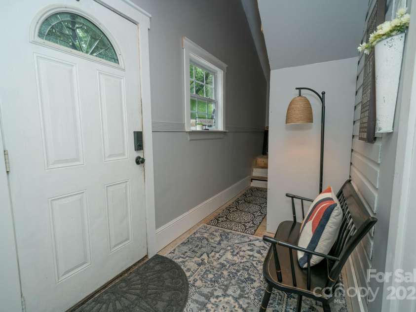 1712 Umstead Street, Charlotte, NC 28205.  MLS# CAR4274346, YatesRealty ID 30104. Back Door area and steps to Attic area