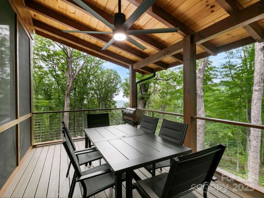 88 Candyland Court, Candler, NC 28715.  MLS# CAR4285213, YatesRealty ID 30108. Screened back porch #2