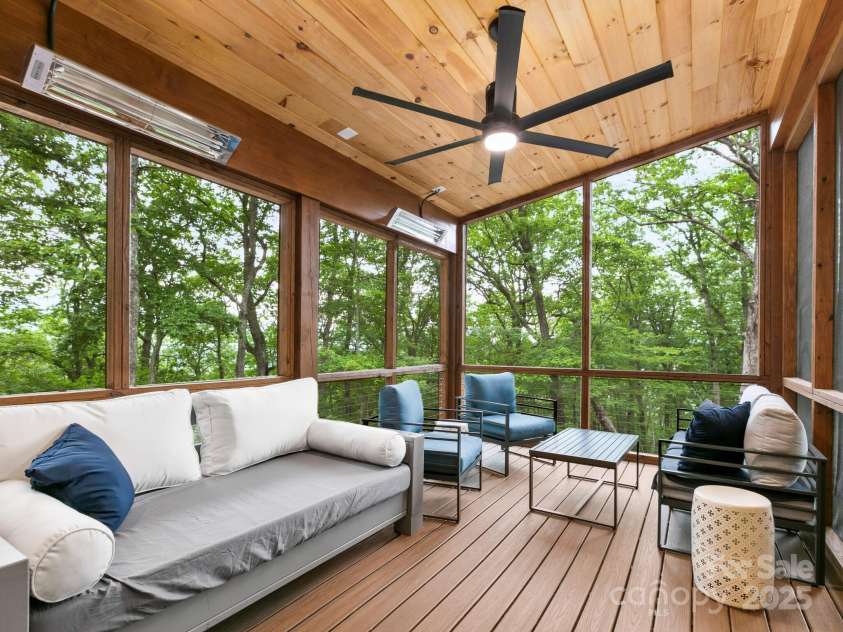 88 Candyland Court, Candler, NC 28715.  MLS# CAR4285213, YatesRealty ID 30108. Screened back porch