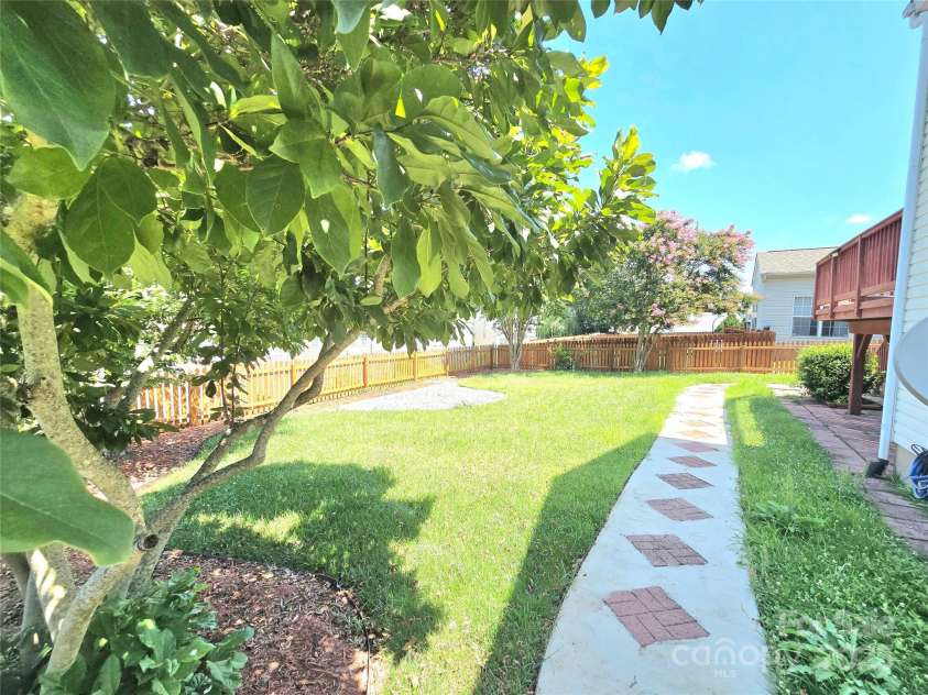 2226 Elendil Lane, Charlotte, NC 28269.  MLS# CAR4264018, YatesRealty ID 30109. Back yard side view
