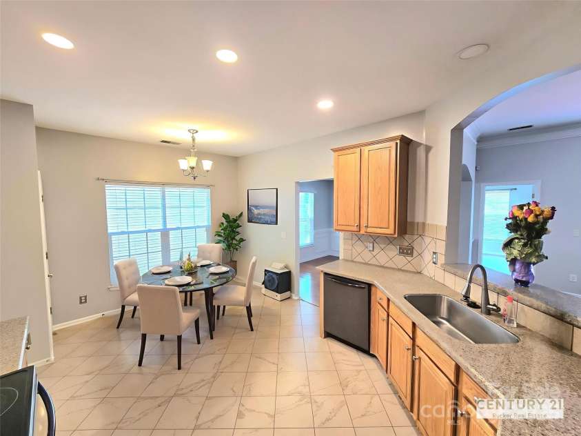 2226 Elendil Lane, Charlotte, NC 28269.  MLS# CAR4264018, YatesRealty ID 30109. Kitchen virtually staged