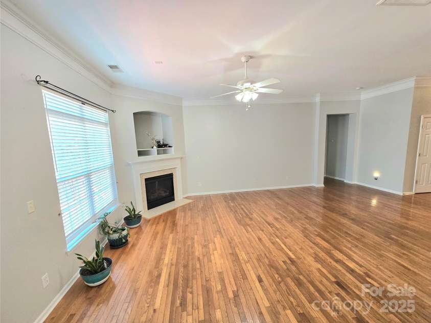 2226 Elendil Lane, Charlotte, NC 28269.  MLS# CAR4264018, YatesRealty ID 30109. Livingroom facing fireplace