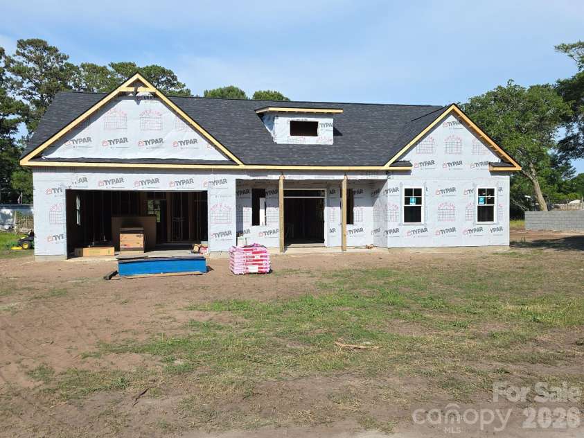 1844 Oak Harbor Drive, Ocean Isle Beach, NC 28469.  MLS# CAR4391799, YatesRealty ID 30110. Construction in progress - front of the house