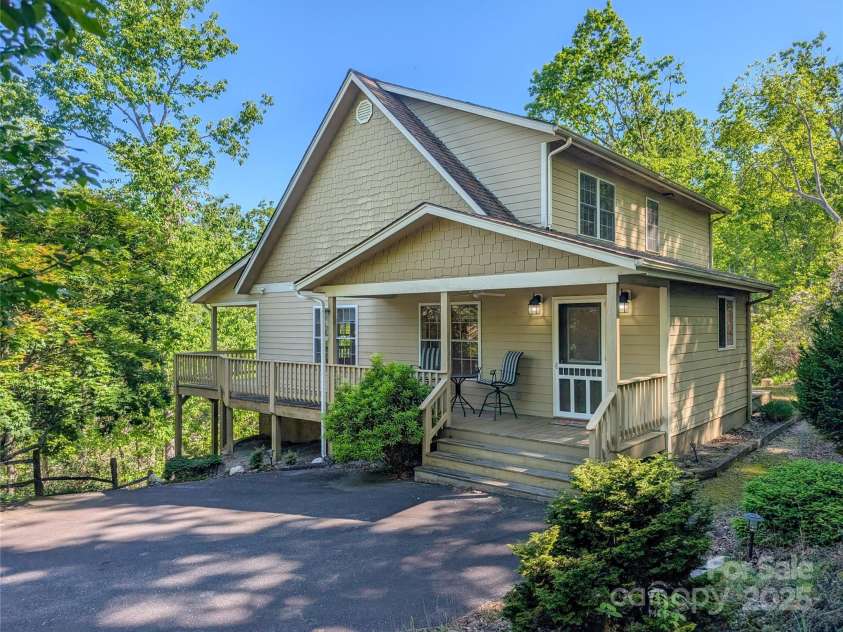 355 Rosewood Lane, Burnsville, NC 28714.  MLS# CAR4263679, YatesRealty ID 30113. This beautiful 3BR/3.5BA home has wrap around porch with covered porch ideal for enjoying the sounds of nature while sipping your coffee!