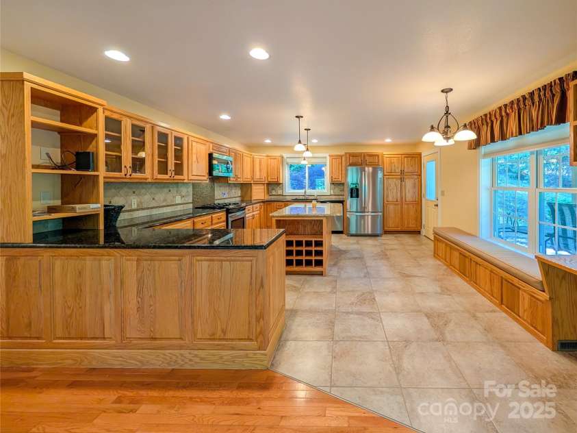 355 Rosewood Lane, Burnsville, NC 28714.  MLS# CAR4263679, YatesRealty ID 30113. View of chef's kitchen from Great Room