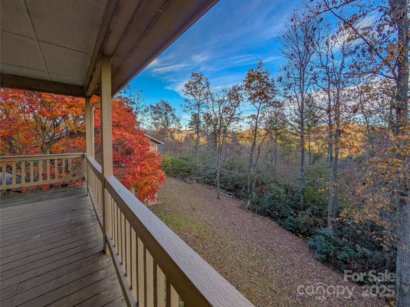 355 Rosewood Lane, Burnsville, NC 28714.  MLS# CAR4326302, YatesRealty ID 30113. Late fall view of the mountains from covered porch! 
