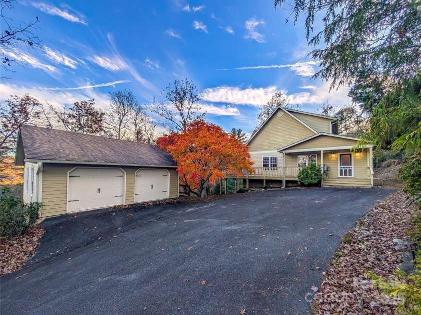 355 Rosewood Lane, Burnsville, NC 28714.  MLS# CAR4326302, YatesRealty ID 30113. This Beautiful Spacious Home boasts over 7.5+ acres of wooded acreage creating a private setting with winter mountain views, over 2,800 Heated SqFt, 3BR/3.5BA, 2 Story Garage that can accommodate up to 3 vehicles or be 