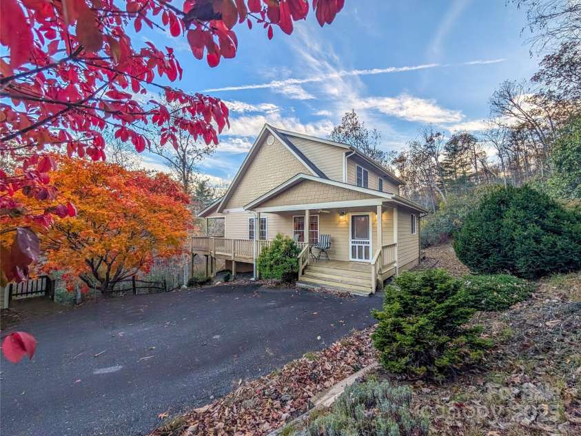 355 Rosewood Lane, Burnsville, NC 28714.  MLS# CAR4326302, YatesRealty ID 30113. Welcome to 355 Rosewood Lane! This Beautiful Home boasts 7.5+ acres of wooded acreage, over 2,800 Heated SqFt, 3BR/3.5BA, 2 Story Garage that can accommodate up to 3 vehicles or be used as studio/workshop & more! 