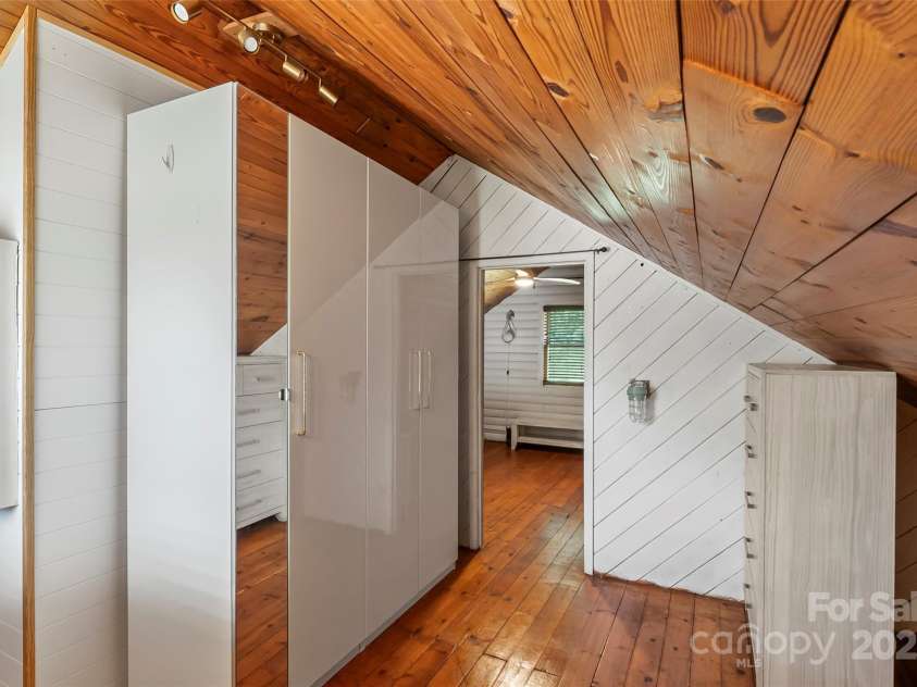 1623 Soco Road, Maggie Valley, NC 28751.  MLS# CAR4281971, YatesRealty ID 30118. Built-in armoire with dual closets