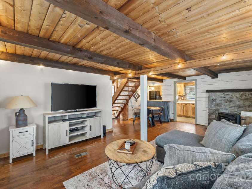 1623 Soco Road, Maggie Valley, NC 28751.  MLS# CAR4281971, YatesRealty ID 30118. Exposed wood beams create an inviting cabin experience