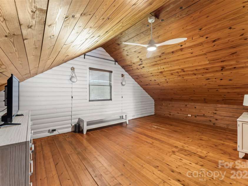 1623 Soco Road, Maggie Valley, NC 28751.  MLS# CAR4281971, YatesRealty ID 30118. Loft bedroom w/ gorgeous wood vaulted ceiling