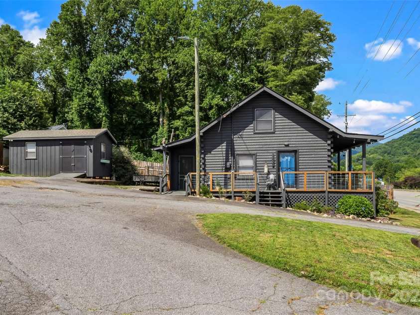 1623 Soco Road, Maggie Valley, NC 28751.  MLS# CAR4281971, YatesRealty ID 30118. Pull up your RV between the house and outbuilding to access the RV hook-up.