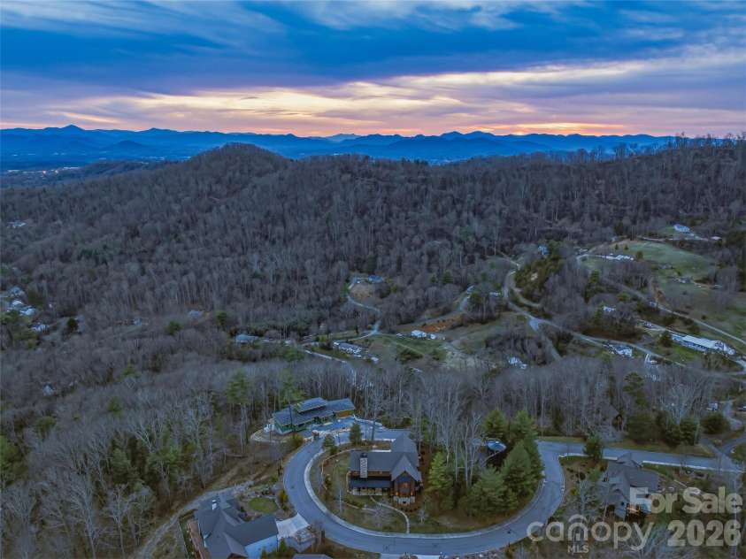 120 Boulder Creek Way, Asheville, NC 28805.  MLS# CAR4356297, YatesRealty ID 30119. Elevated ridgeline setting with protected long-range Blue Ridge views