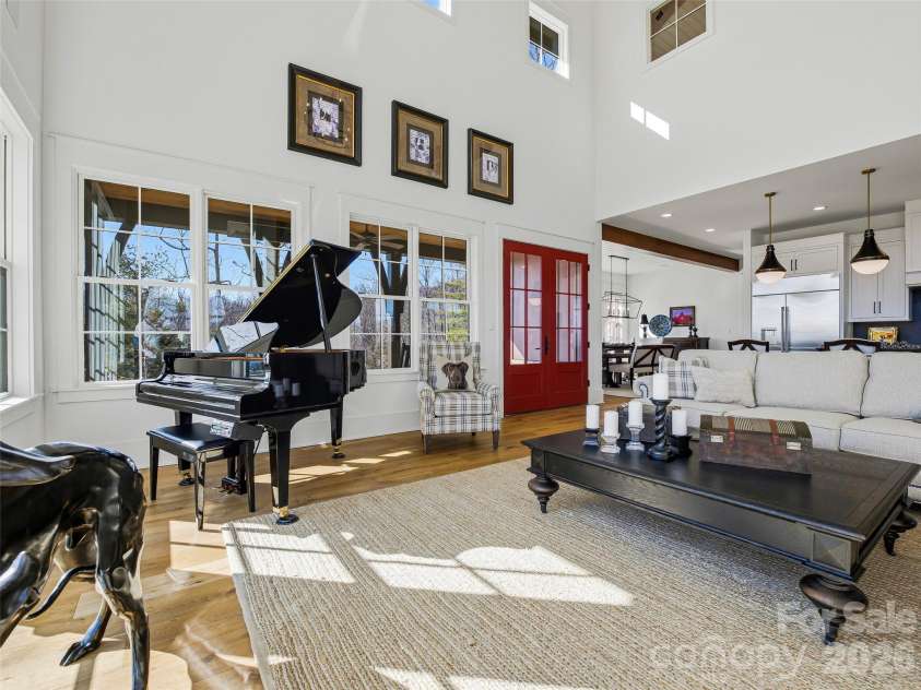 120 Boulder Creek Way, Asheville, NC 28805.  MLS# CAR4356297, YatesRealty ID 30119. Great room, kitchen & dining—one seamless, intentional space