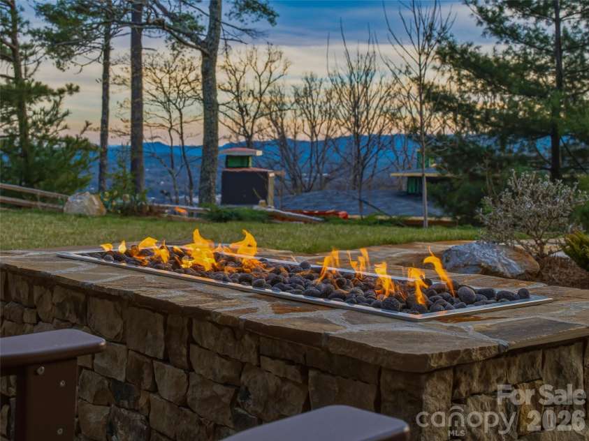 120 Boulder Creek Way, Asheville, NC 28805.  MLS# CAR4356297, YatesRealty ID 30119. Sunset gathering spaces designed to maximize the year-round mountain backdrop