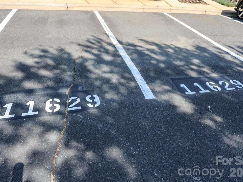 11629 Boxer Lane, Charlotte, NC 28269.  MLS# CAR4376110, YatesRealty ID 30122. 2 designated parking spots