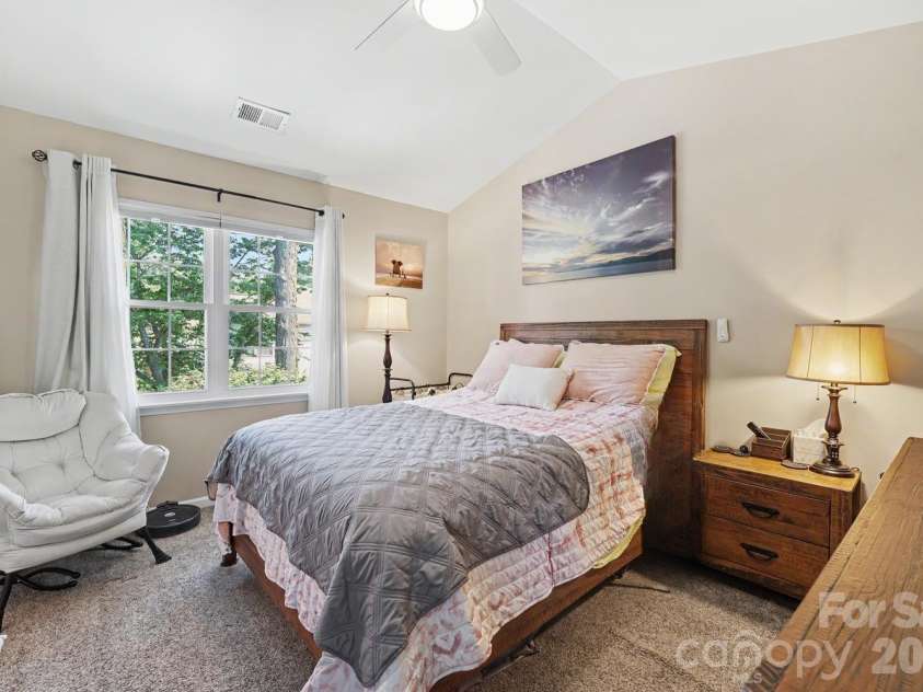 11629 Boxer Lane, Charlotte, NC 28269.  MLS# CAR4376110, YatesRealty ID 30122. Primary bedroom with vaulted ceiling