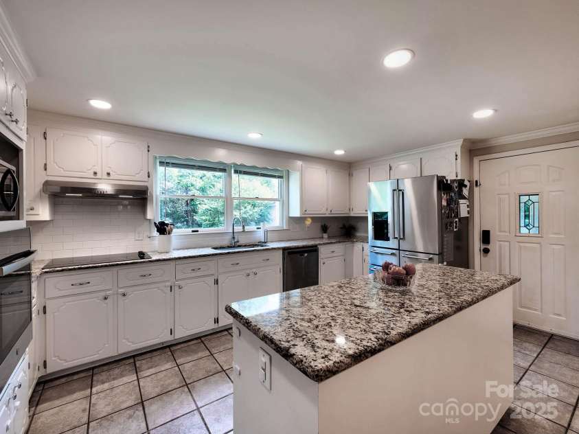 228 Parkwood Drive, Concord, NC 28027.  MLS# CAR4282049, YatesRealty ID 30123. 