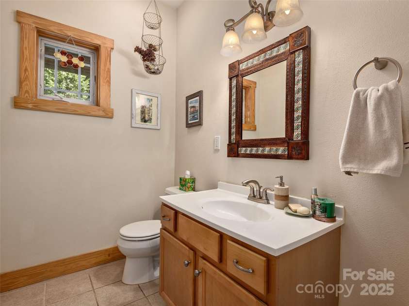 264 Charming Lane, Hendersonville, NC 28792.  MLS# CAR4283133, YatesRealty ID 30126. Powder Room