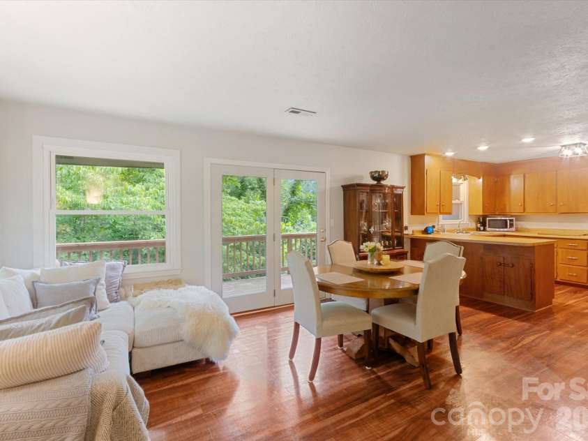 132 Whisperwood Circle, Hendersonville, NC 28791.  MLS# CAR4378747, YatesRealty ID 30127. Dining Room with Deck Access