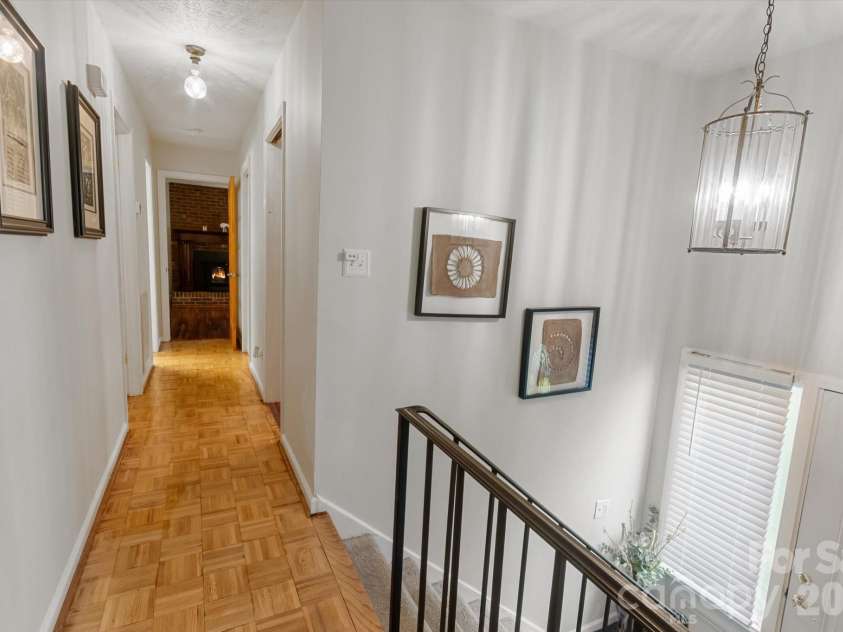 132 Whisperwood Circle, Hendersonville, NC 28791.  MLS# CAR4378747, YatesRealty ID 30127. Heading Downstairs...