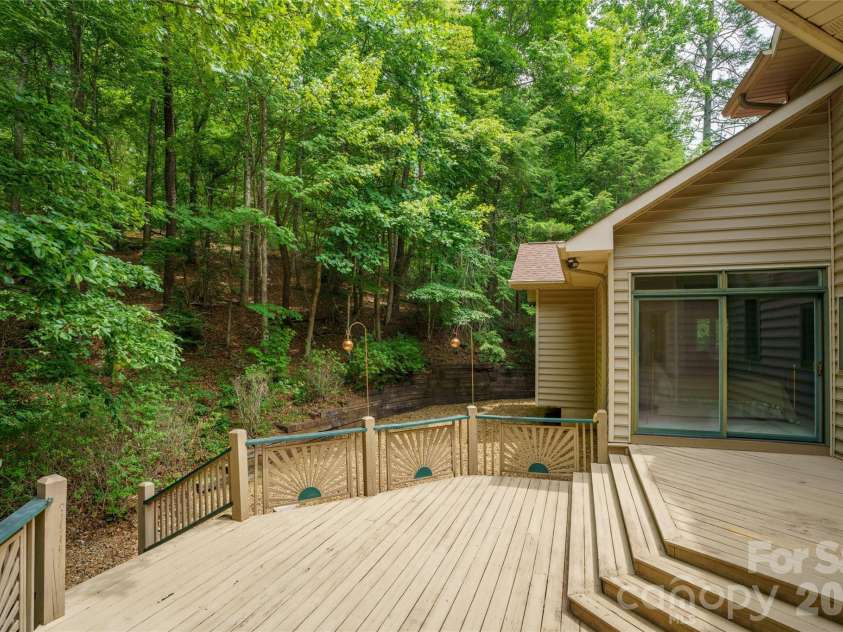 136 Rumbling Bald Road, Lake Lure, NC 28746.  MLS# CAR4393328, YatesRealty ID 30129. Back deck