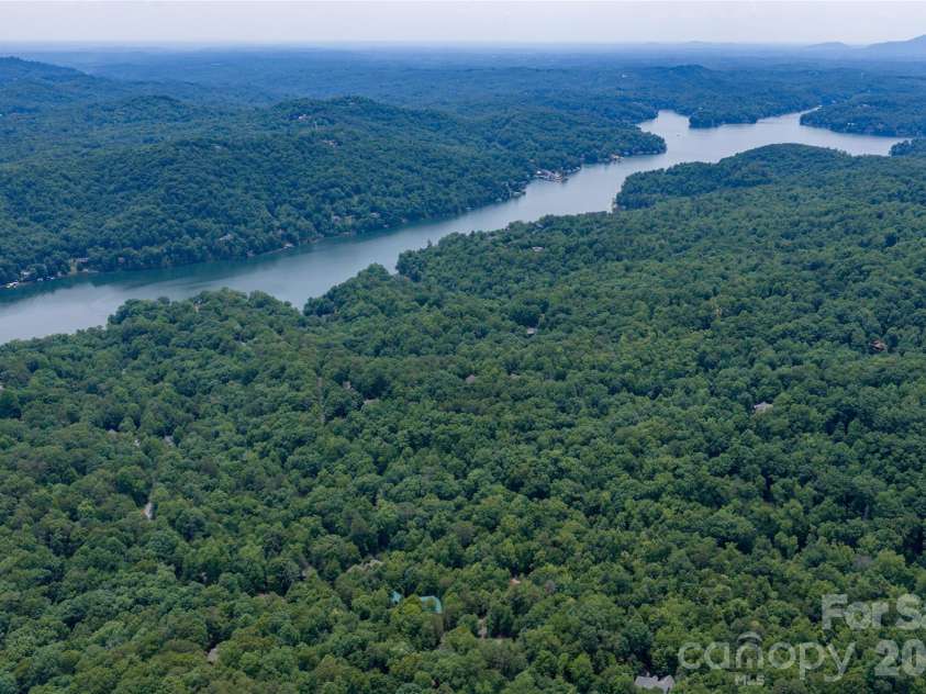 136 Rumbling Bald Road, Lake Lure, NC 28746.  MLS# CAR4393328, YatesRealty ID 30129. Lake Lure