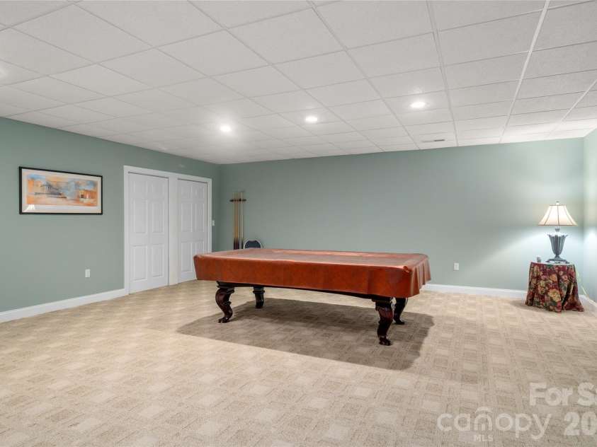 136 Rumbling Bald Road, Lake Lure, NC 28746.  MLS# CAR4393328, YatesRealty ID 30129. Pool table