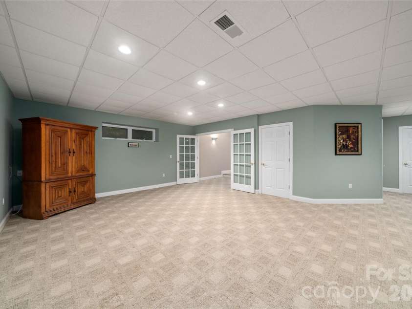 136 Rumbling Bald Road, Lake Lure, NC 28746.  MLS# CAR4393328, YatesRealty ID 30129. Rec room