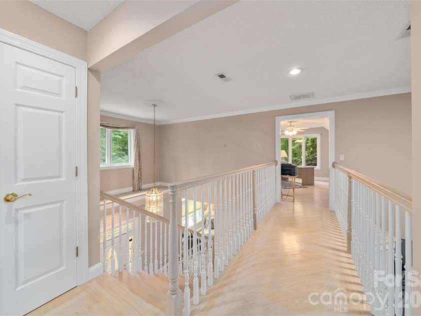136 Rumbling Bald Road, Lake Lure, NC 28746.  MLS# CAR4393328, YatesRealty ID 30129. Upper hallway