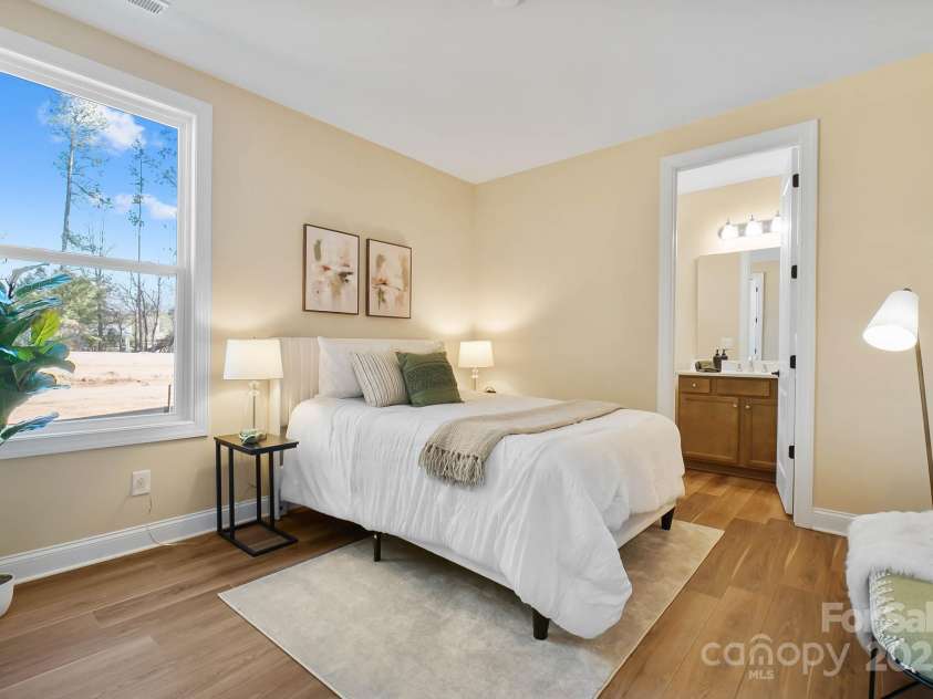 13101 Cozy Court, Charlotte, NC 28215.  MLS# CAR4232874, YatesRealty ID 30134. En-suite Bedroom on Main Level