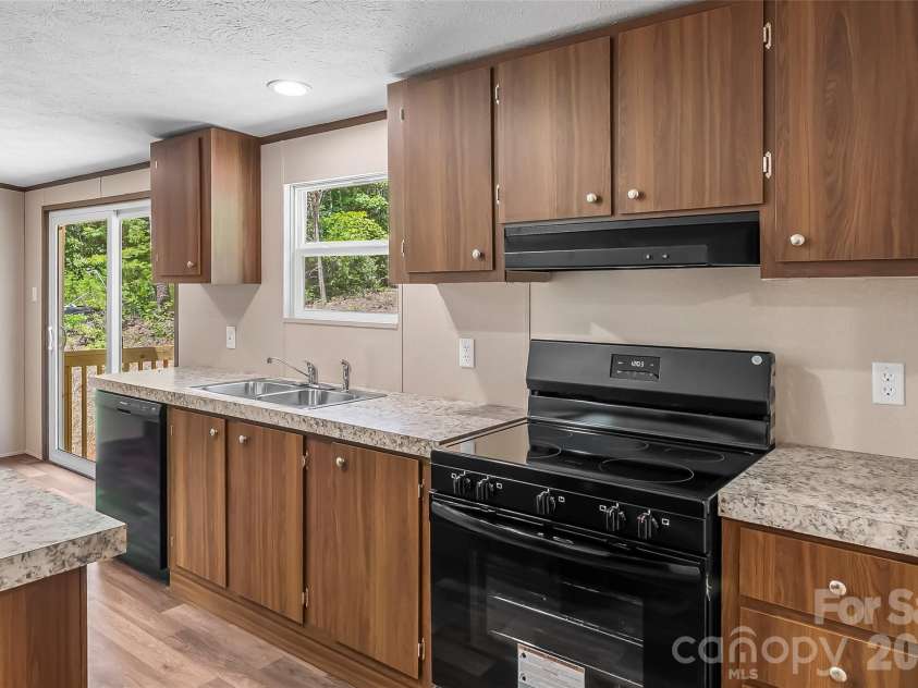 257 Brookwood Drive, Marion, NC 28752.  MLS# CAR4391967, YatesRealty ID 30134. 