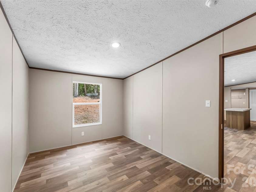 257 Brookwood Drive, Marion, NC 28752.  MLS# CAR4391967, YatesRealty ID 30134. 