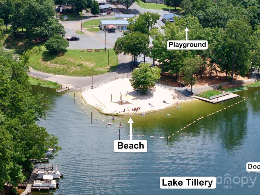 146 Twin Bluff Trail, Mount Gilead, NC 27306.  MLS# CAR4284398, YatesRealty ID 30135. Two Boat Ramps & Various Fishing Docks.  Building beside playground is where Bingo, Craft Fairs & Various events are held.