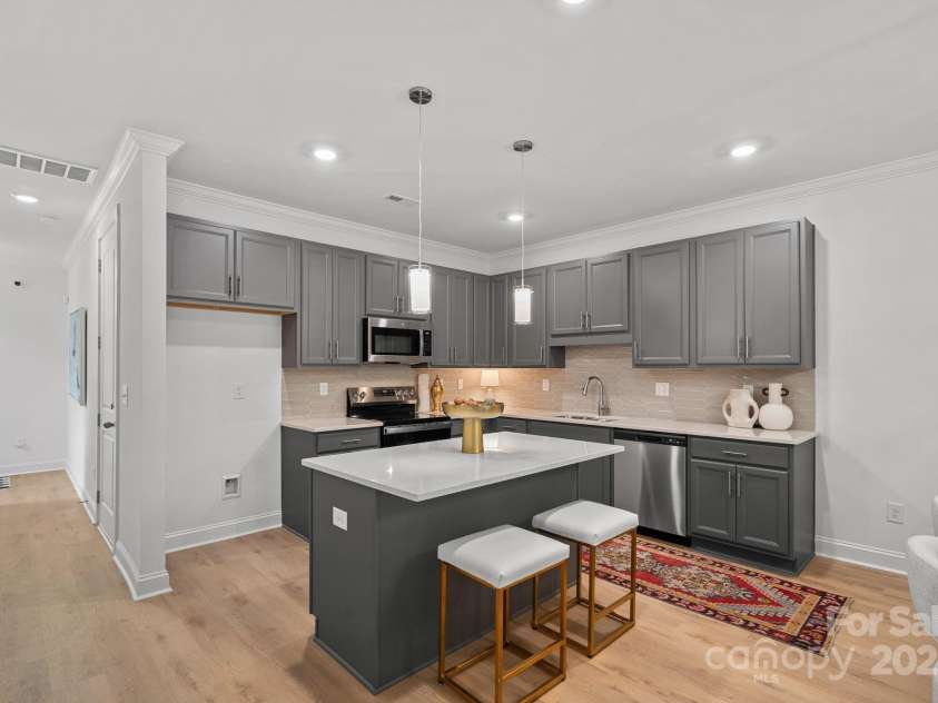 1310 Moretz Avenue, Charlotte, NC 28206.  MLS# CAR4278964, YatesRealty ID 30137. Similar unit - interior finishes may very