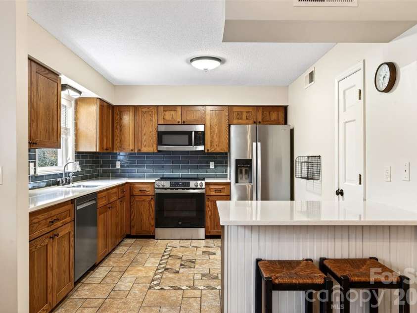 72 Country Club Woods Drive, Spruce Pine, NC 28777.  MLS# CAR4341517, YatesRealty ID 3014. 