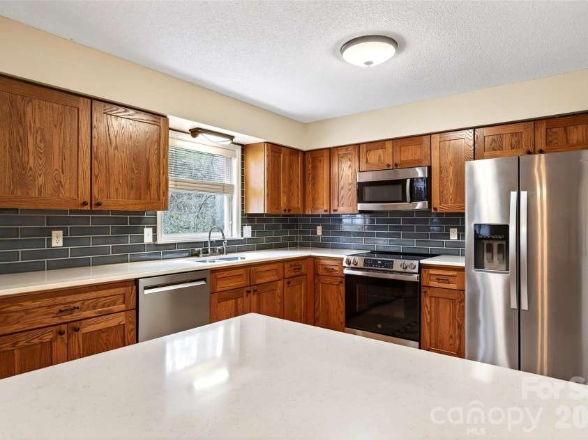 72 Country Club Woods Drive, Spruce Pine, NC 28777.  MLS# CAR4341517, YatesRealty ID 3014. 