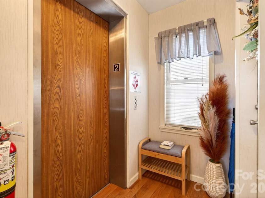 72 Country Club Woods Drive, Spruce Pine, NC 28777.  MLS# CAR4341517, YatesRealty ID 3014. Entrance from the elevator