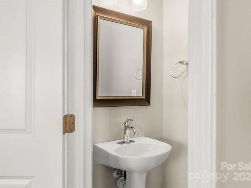 111 Tilton Drive, Mooresville, NC 28115.  MLS# CAR4254462, YatesRealty ID 30141. Half bath powder room on main floor.