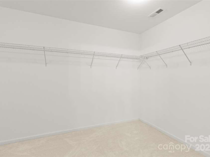 111 Tilton Drive, Mooresville, NC 28115.  MLS# CAR4254462, YatesRealty ID 30141. Look at all the room in the upstairs primary closet!