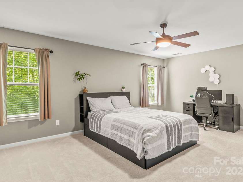 111 Tilton Drive, Mooresville, NC 28115.  MLS# CAR4254462, YatesRealty ID 30141. Main level primary bedroom.