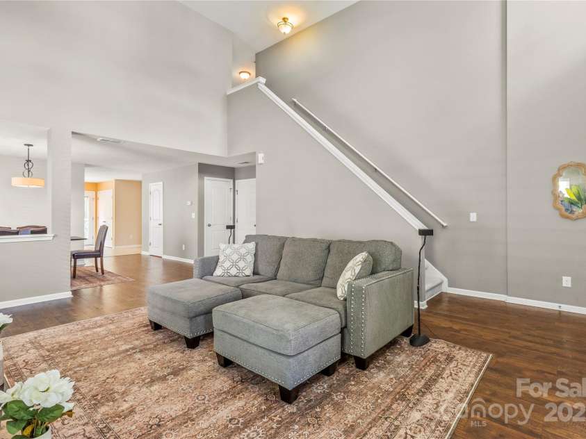 111 Tilton Drive, Mooresville, NC 28115.  MLS# CAR4254462, YatesRealty ID 30141. View of open floor plan from great room to dining area and kitchen.