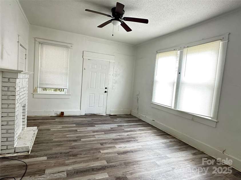 140 Eighth Street, Winnsboro, SC 29180.  MLS# CAR4287448, YatesRealty ID 30143. Living Room