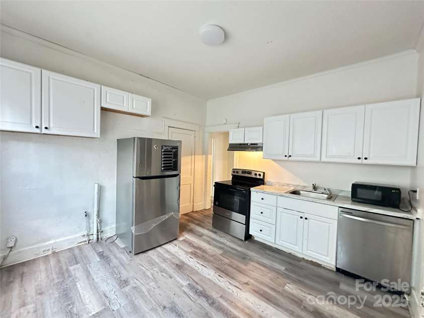 140 Eighth Street, Winnsboro, SC 29180.  MLS# CAR4287448, YatesRealty ID 30143. Unit 1 Kitchen