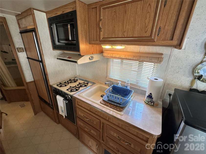 117 Elm Street, New London, NC 28127.  MLS# CAR4390963, YatesRealty ID 30145. 