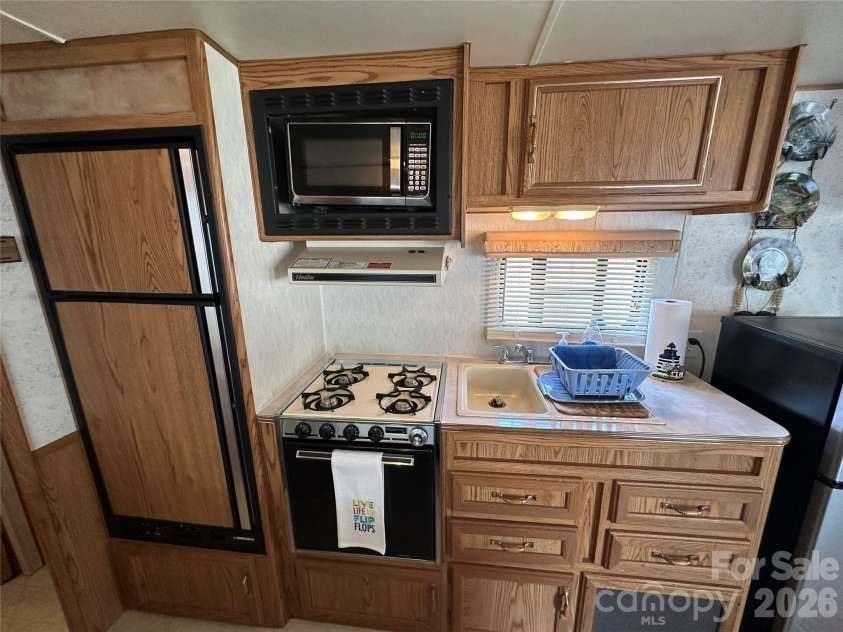 117 Elm Street, New London, NC 28127.  MLS# CAR4390963, YatesRealty ID 30145. 