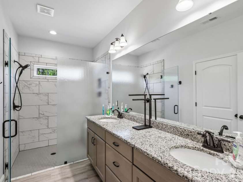 5301 Garden Gate Drive, Monroe, NC 28112.  MLS# CAR4382956, YatesRealty ID 30149. Primary Bathroom