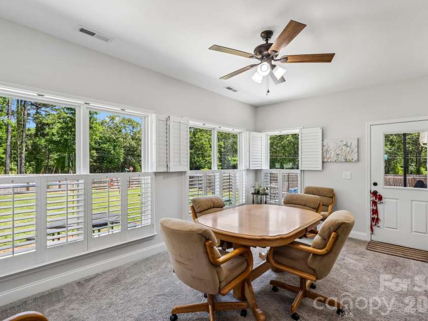 5301 Garden Gate Drive, Monroe, NC 28112.  MLS# CAR4382956, YatesRealty ID 30149. Sunroom